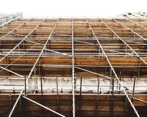 Scaffolding alongside a building under renovation or redevelopment.