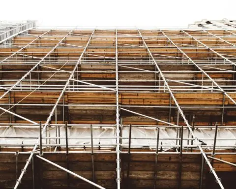 Scaffolding alongside a building under renovation or redevelopment.