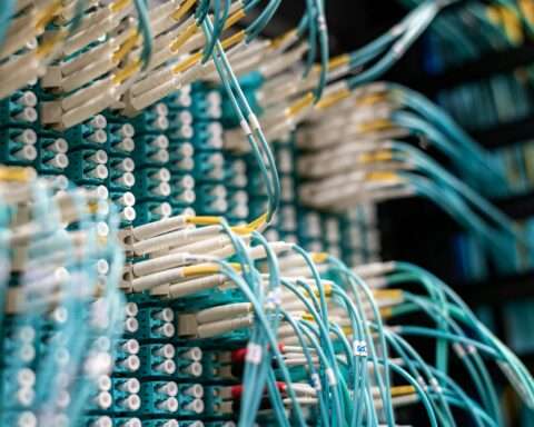 Broadband cables connect to an internet device.
