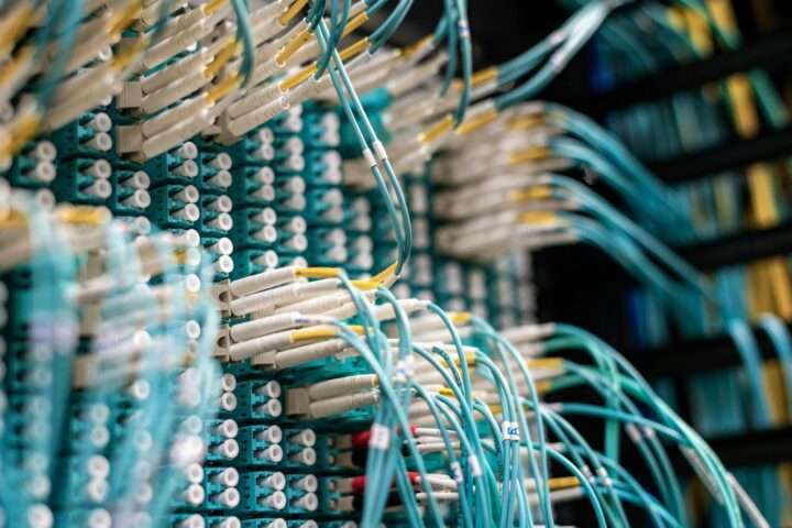 Broadband cables connect to an internet device.