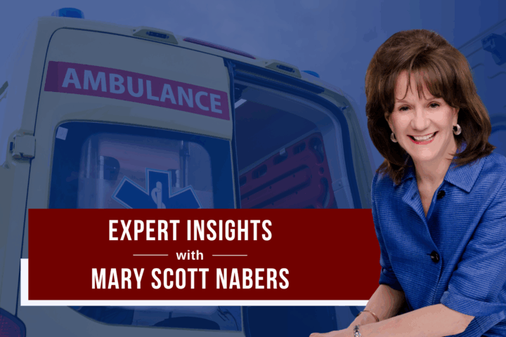 Mary Scott Nabers before an ambulance for her weekly column about public safety projects.