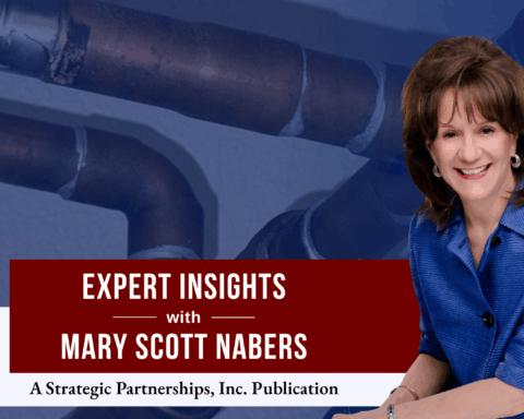 Mary Scott Nabers before a water delivery pipe for her weekly column.
