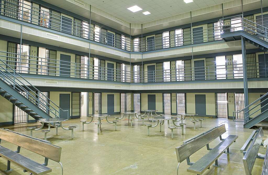 The interior of a jail complex room.