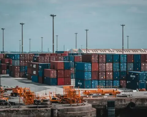 Containers at a yard at a port from a distance.