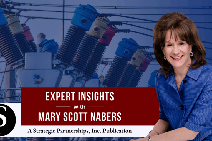 Mary Scott Nabers before an electric transformer for her weekly column.