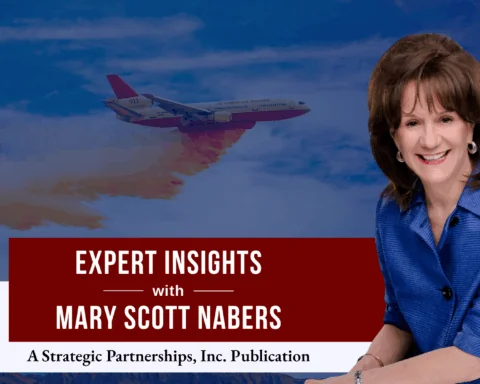 Mary Scott Nabers before a firefighting plane for her weekly column, this week about resilience initiatives.