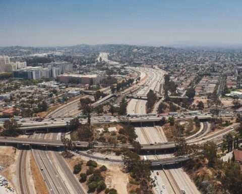 An aerial shot of California transportation infrastructure and highways in Los Angeles.