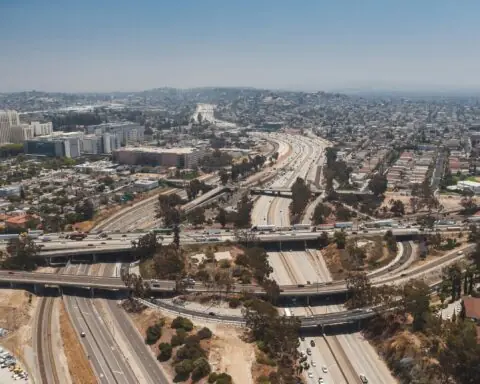 An aerial shot of California transportation infrastructure and highways in Los Angeles.