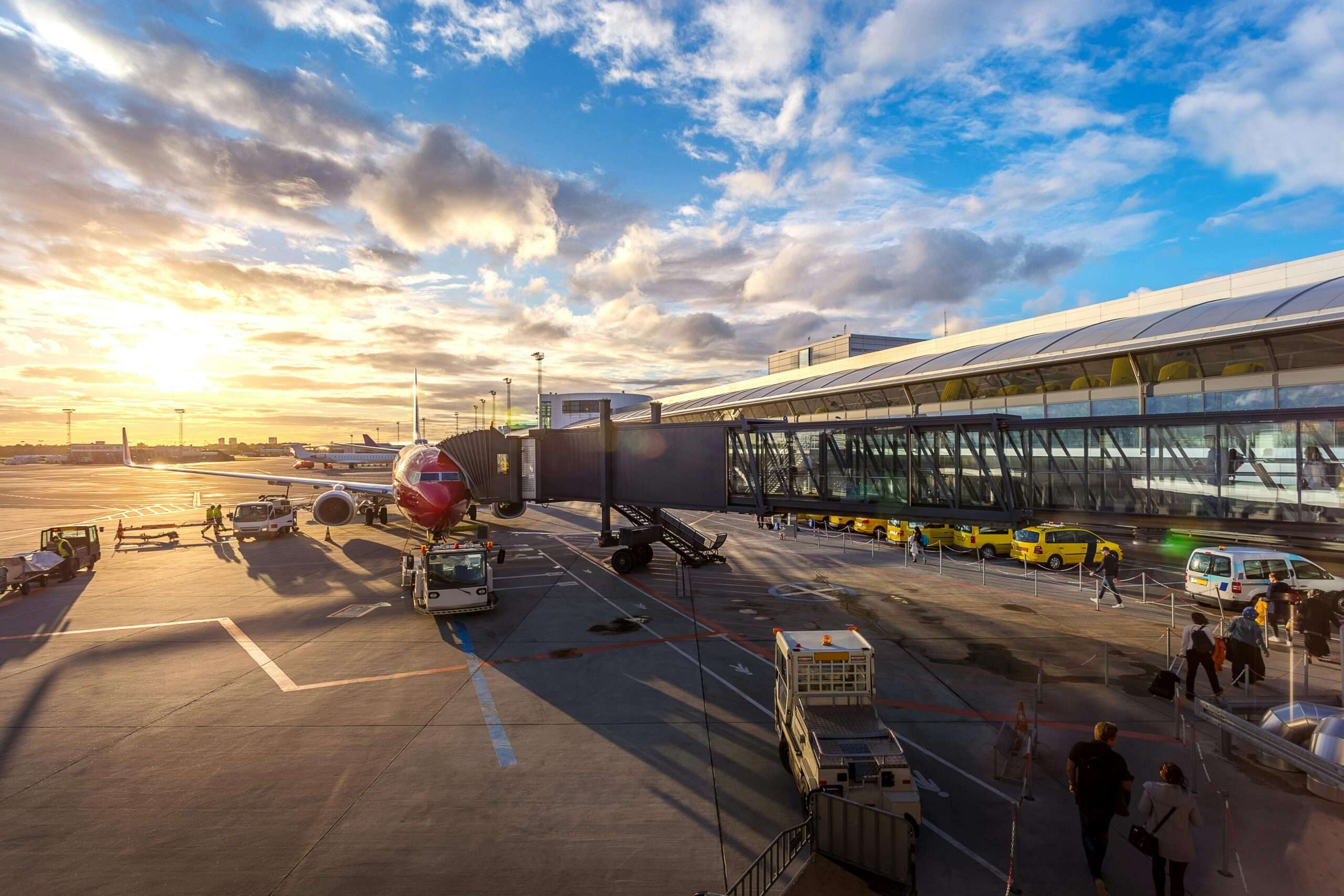 An airplane parked at a gate at an airport.