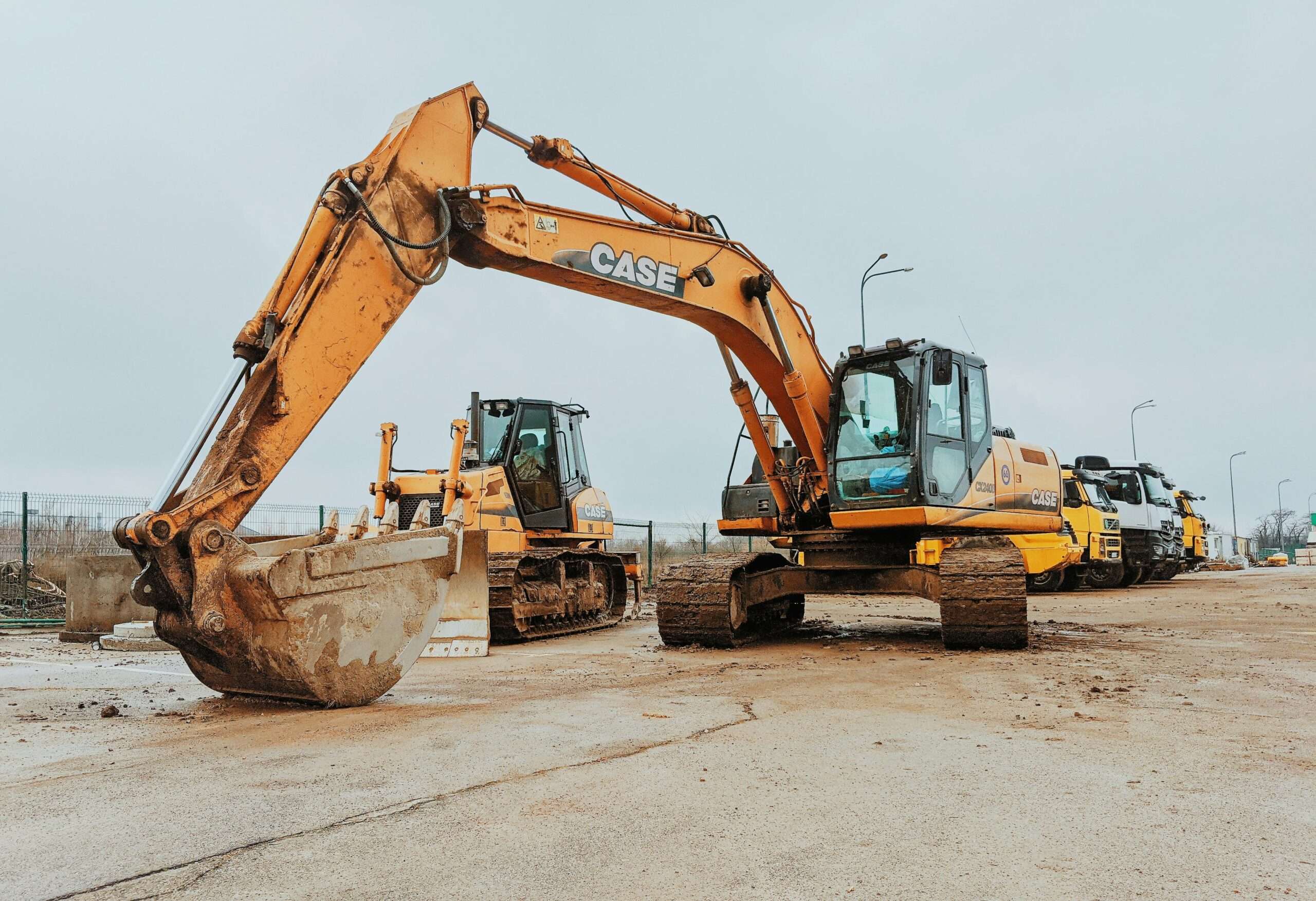 Two construction vehicles on a site.