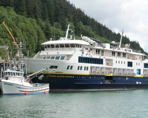A ship docked at a port in Alaska.