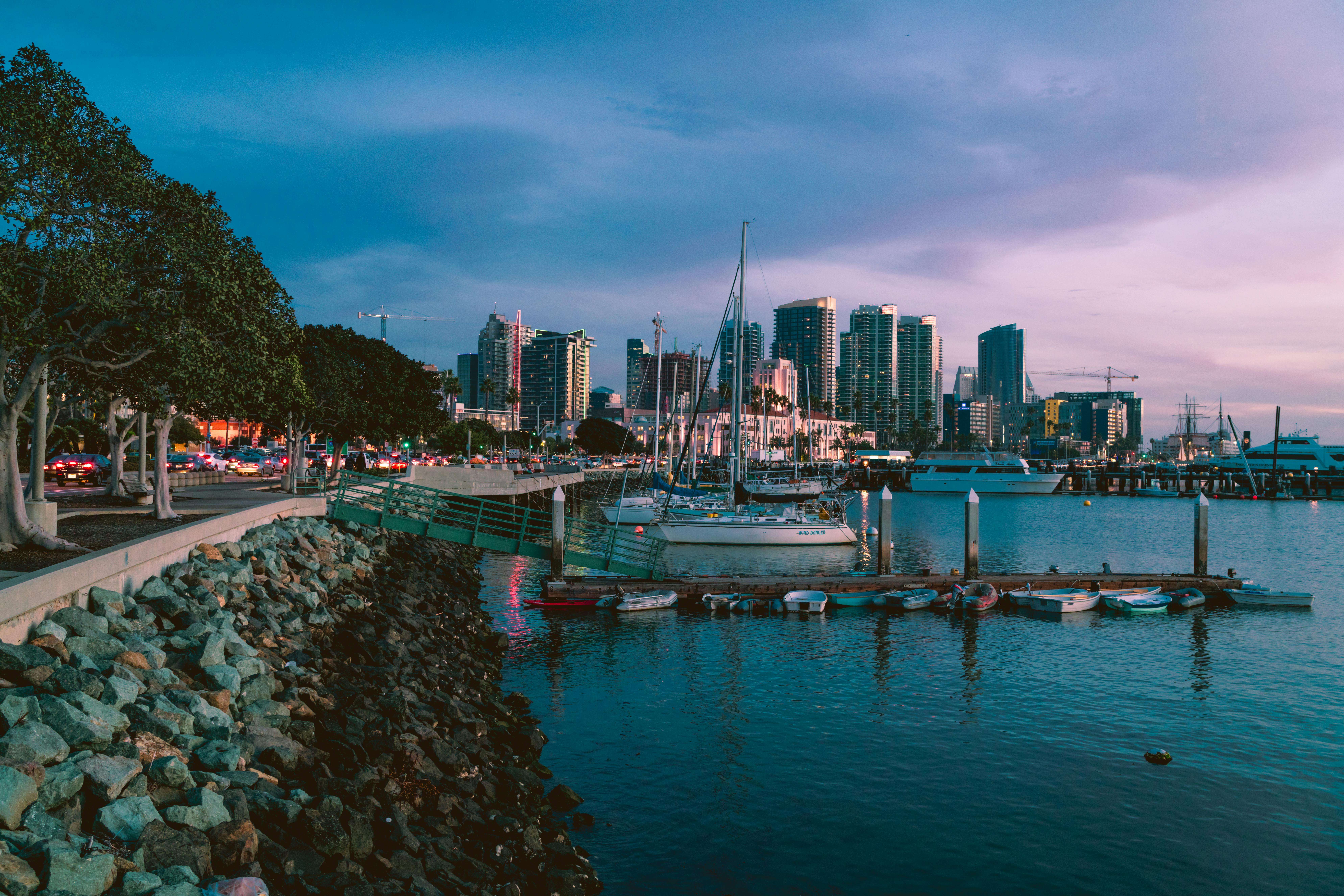 The San Diego skyline from a distance over water.