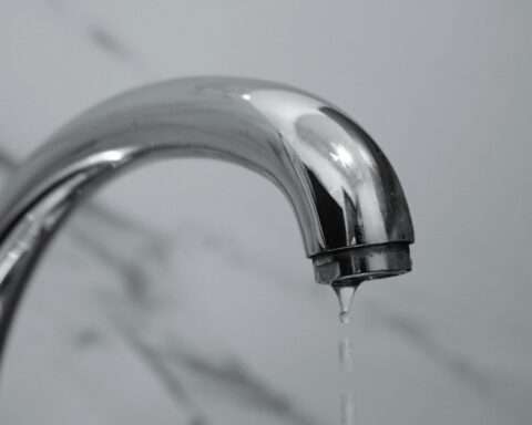 A faucet dripping water.