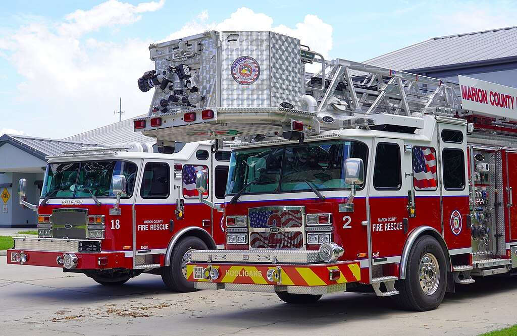 Two fire trucks in front of the Marion County Fire Station in Georgia.