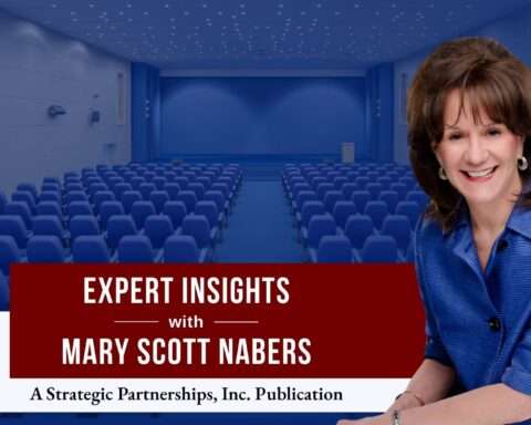 Mary Scott Nabers before a convention center room for her weekly column
