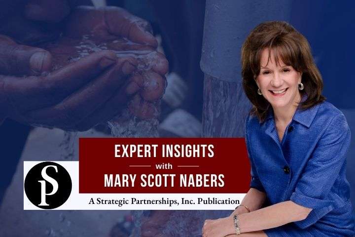 Mary Scott Nabers before water and a child's hands for her weekly column.