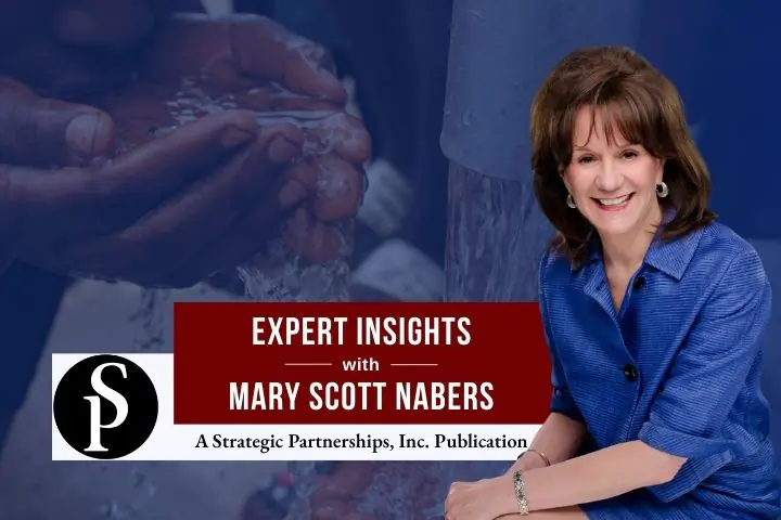 Mary Scott Nabers before water and a child's hands for her weekly column.