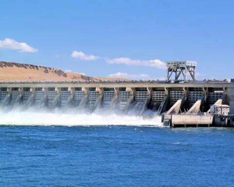 A hydroelectric dam from across the water.