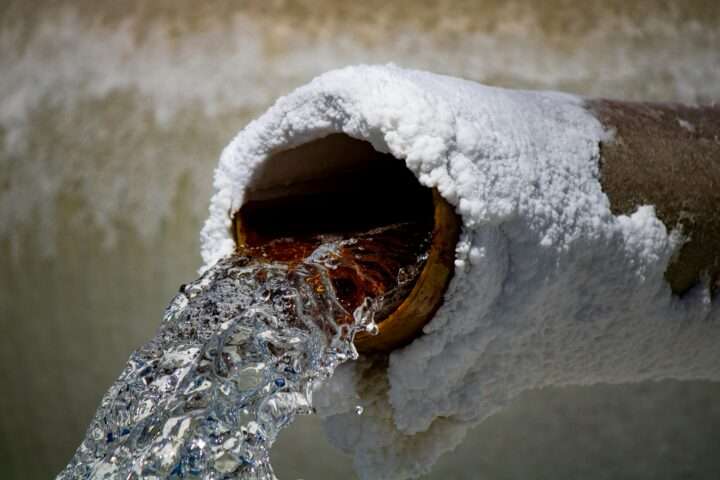 A frozen pipe pour water below the image.