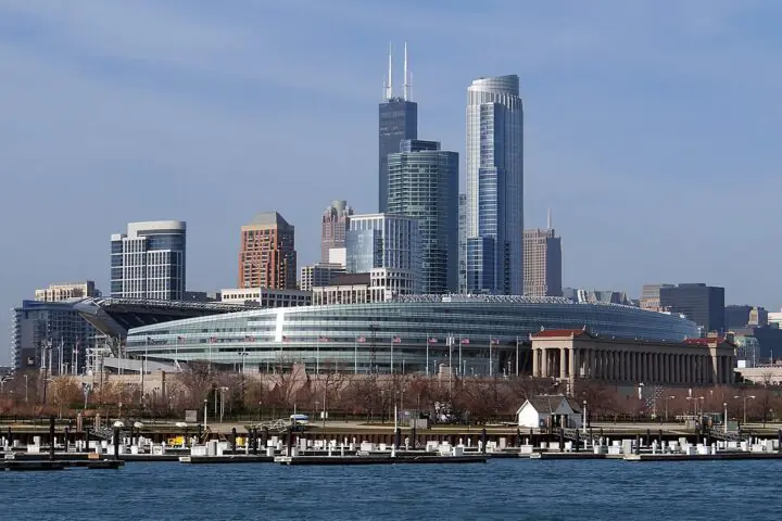 Soldier Field in Chicago from across the river before the Chicago city skyline.