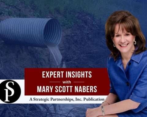 Mary Scott Nabers before a wastewater pipe for her weekly column.