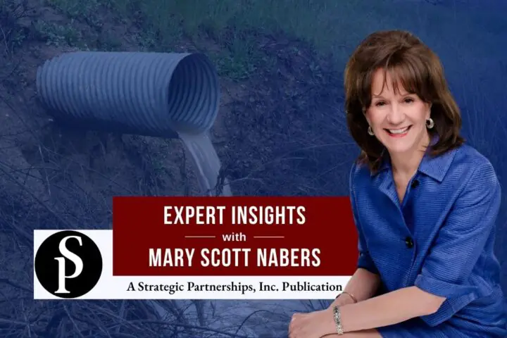 Mary Scott Nabers before a wastewater pipe for her weekly column.