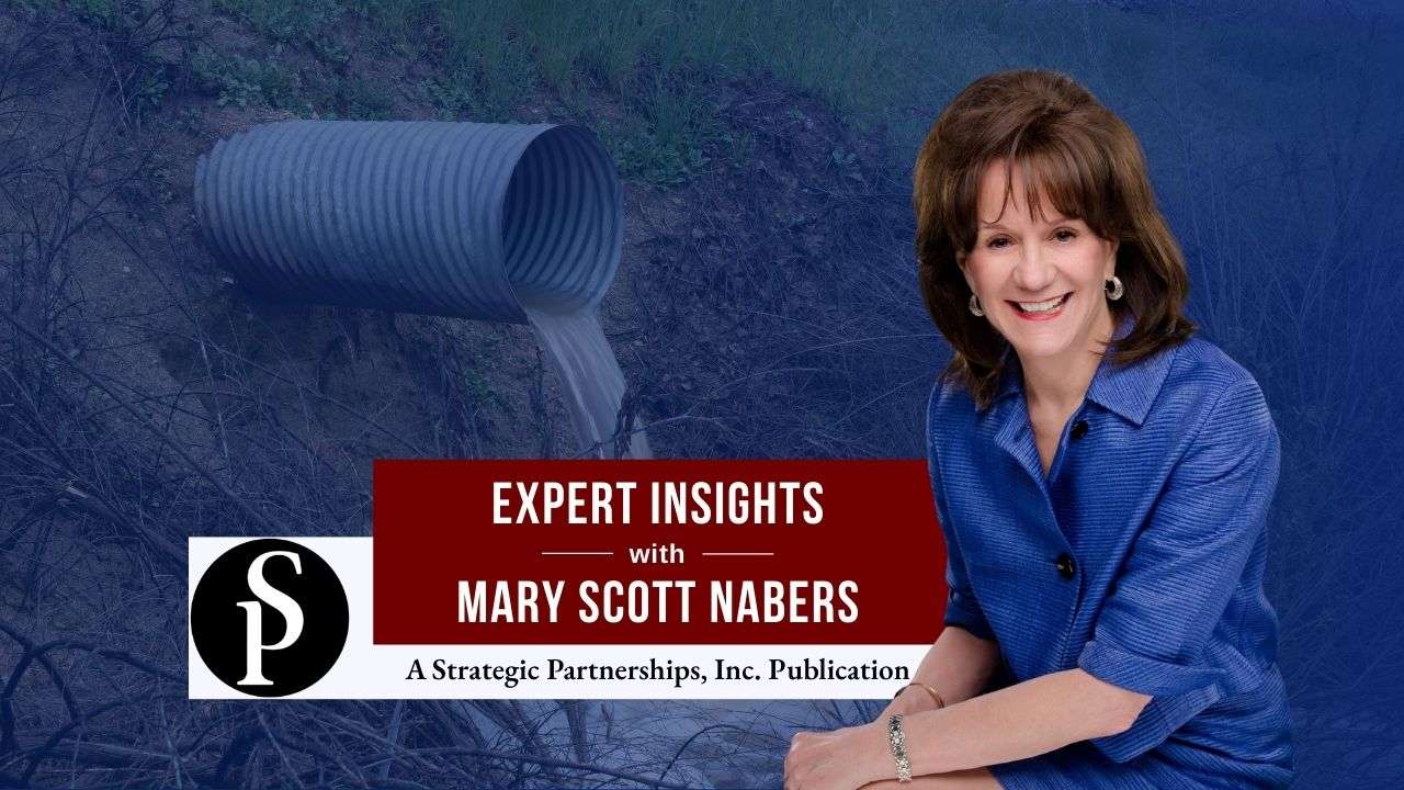 Mary Scott Nabers before a wastewater pipe for her weekly column.