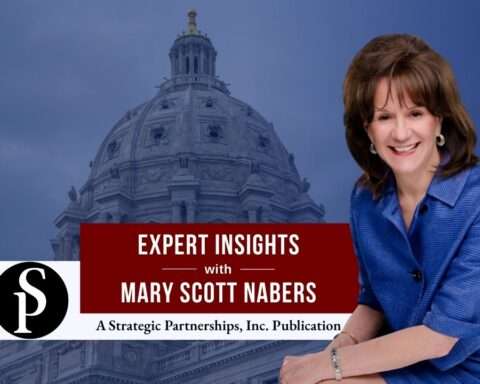 Mary Scott Nabers before a state capitol building for her weekly column.