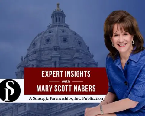 Mary Scott Nabers before a state capitol building for her weekly column.