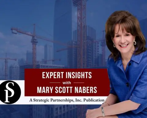 Mary Scott Nabers before construction vehicles and cranes for her weekly column.