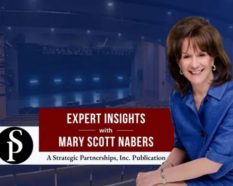 Mary Scott Nabers before a convention center auditorium for her weekly column.