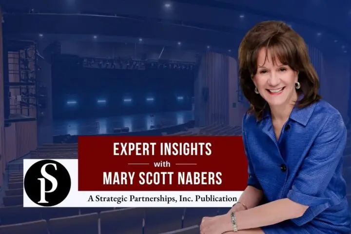 Mary Scott Nabers before a convention center auditorium for her weekly column.