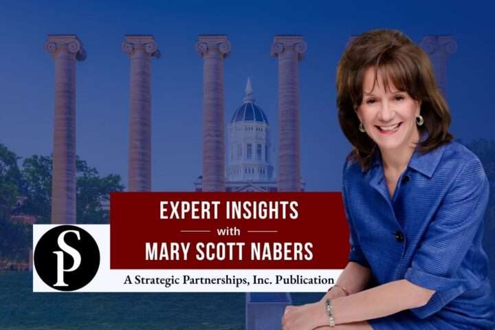 Mary Scott Nabers before the entrance of a university for her weekly column.