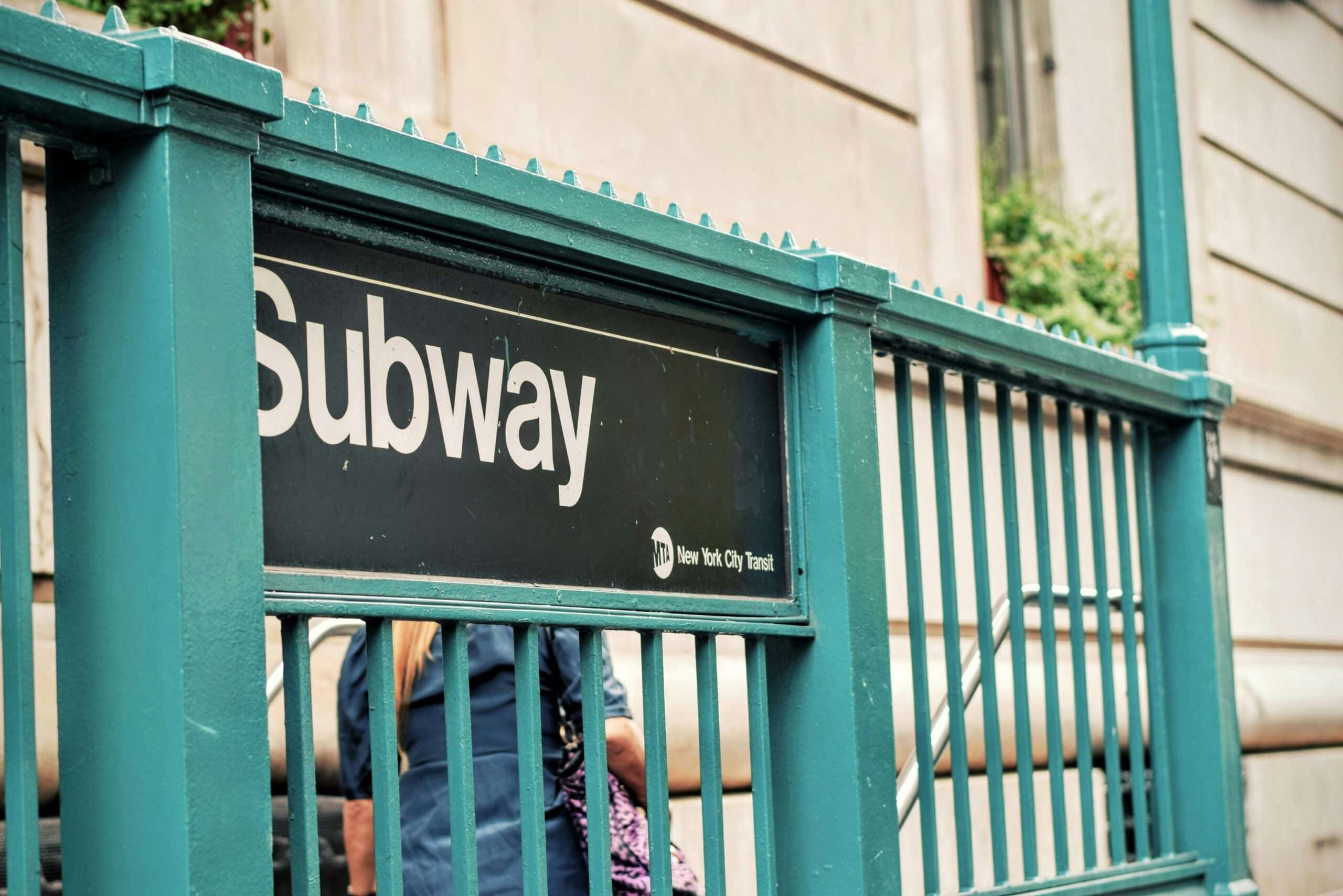 A subway sign outside of a New York City subway station.
