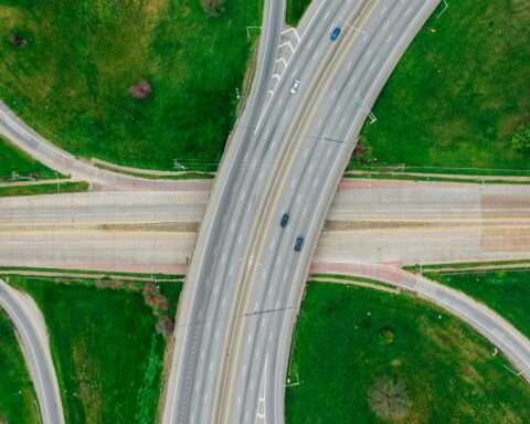 An aerial view of a highway intersection or interchange.