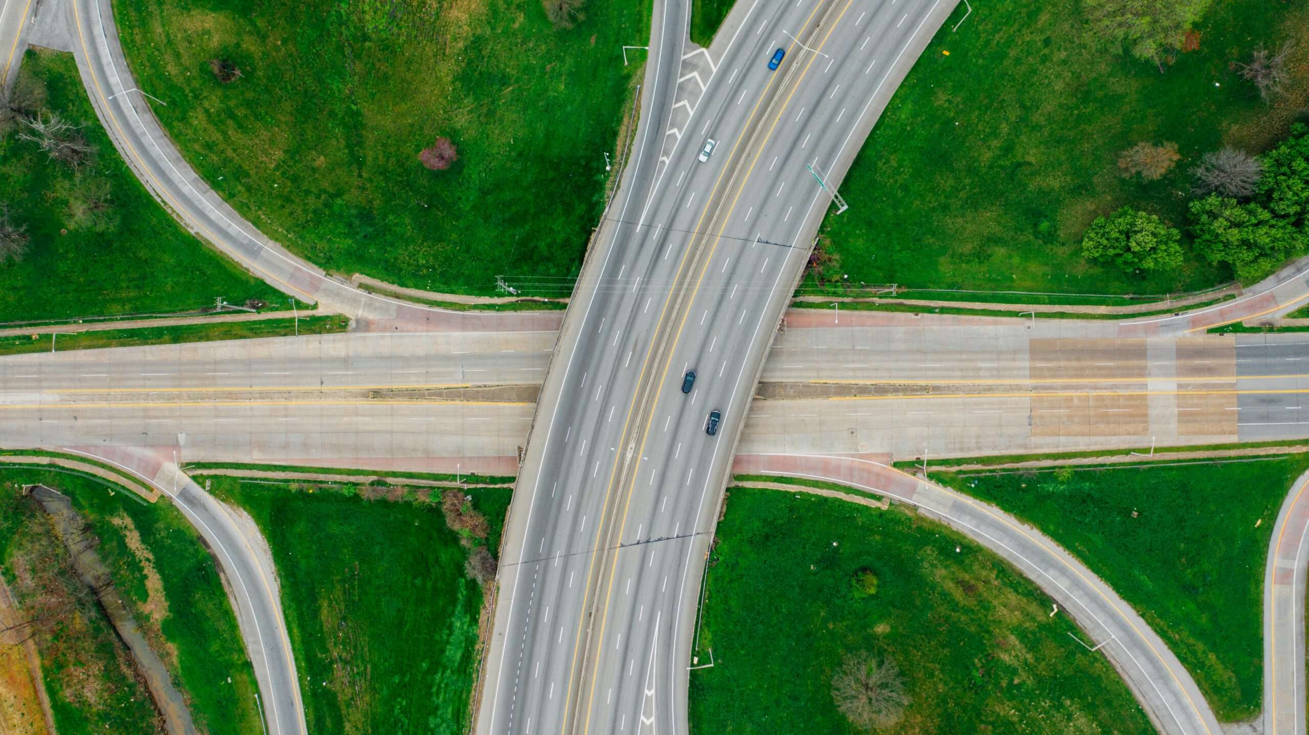 An aerial view of a highway intersection or interchange.