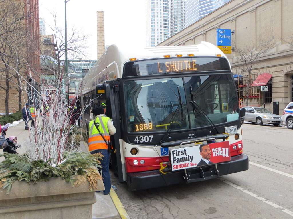 A rider approaches a CTA bus in Illinois.