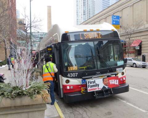 A rider approaches a CTA bus in Illinois.
