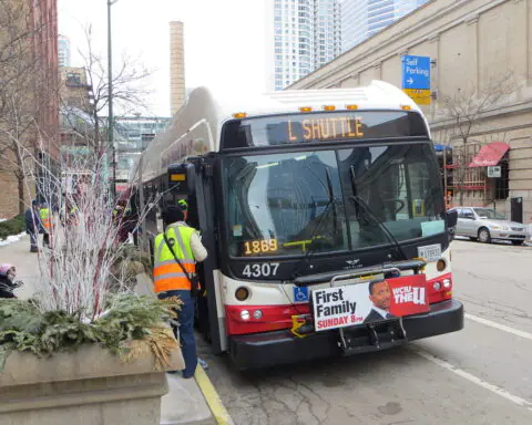 A rider approaches a CTA bus in Illinois.