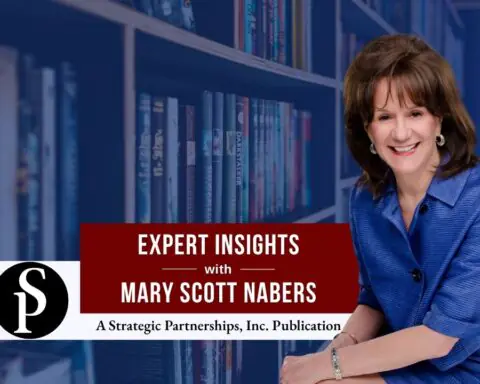Mary Scott Nabers before a library with books for her weekly column.