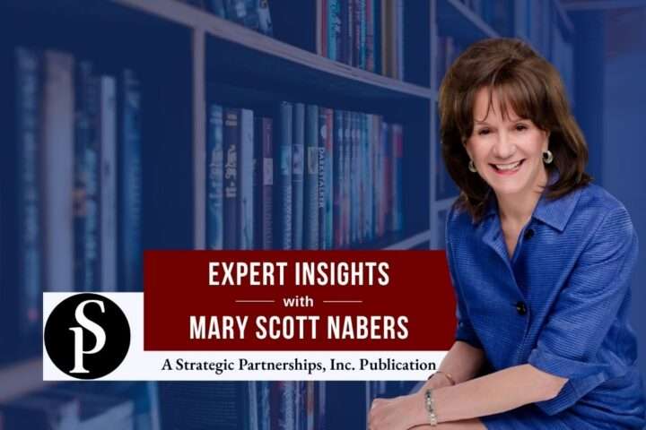 Mary Scott Nabers before a library with books for her weekly column.
