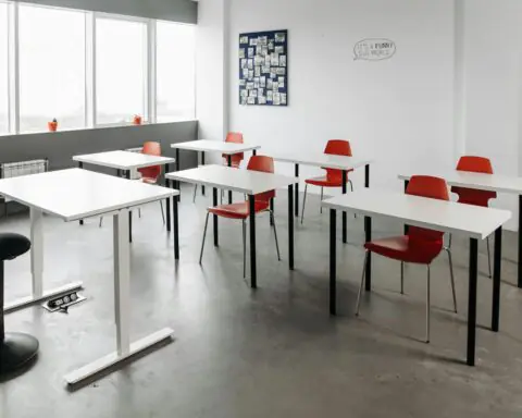 An empty middle school classroom on a sunny day.