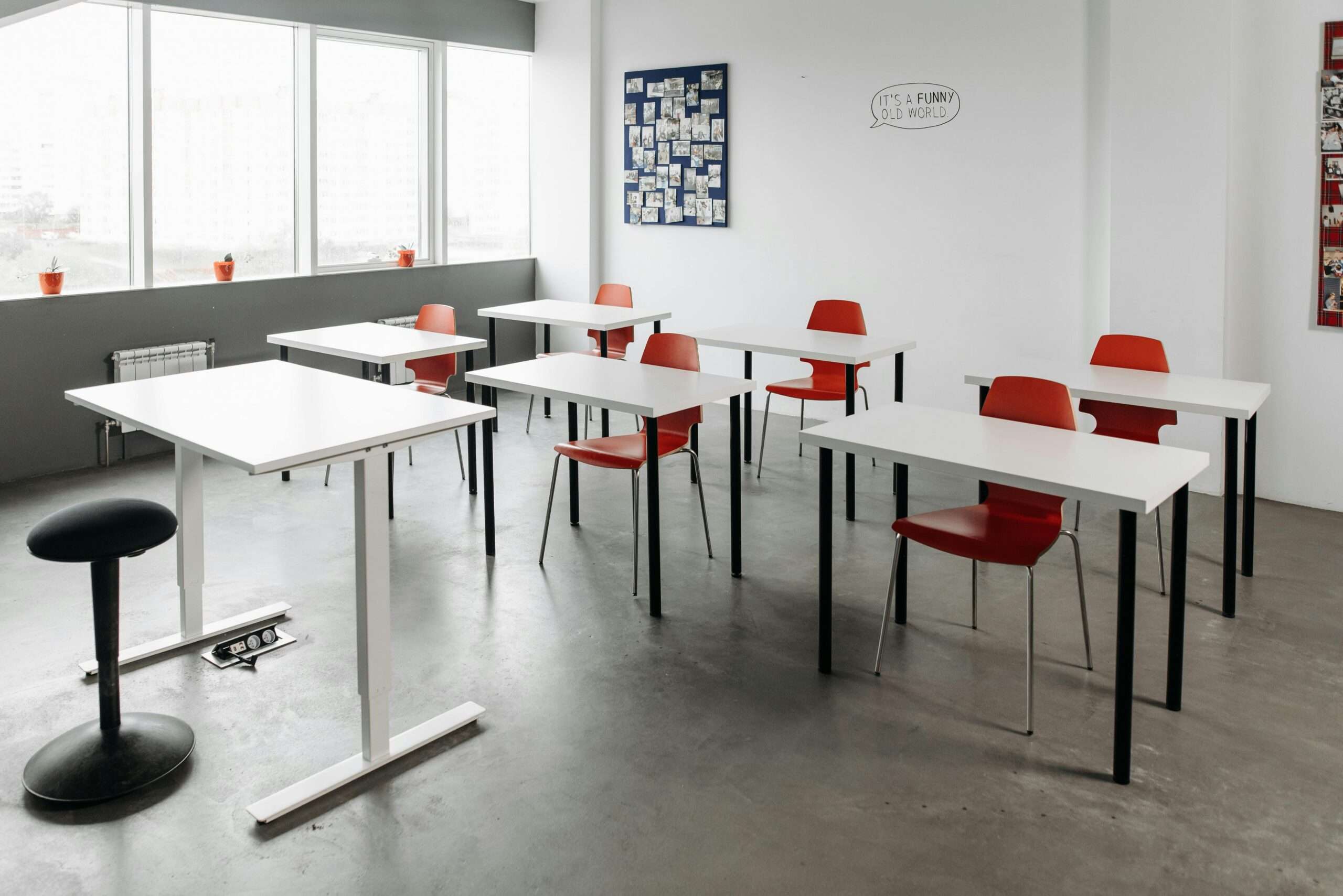 An empty middle school classroom on a sunny day.