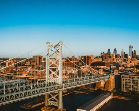 A view of a bridge and transportation infrastructure in Philadelphia.