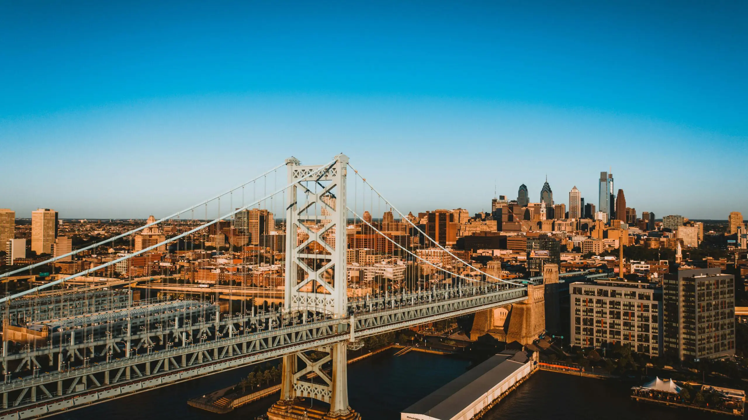 A view of a bridge and transportation infrastructure in Philadelphia.