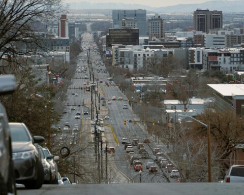 A view of a busy street stretching to the distance in Salt Lake City, Utah.