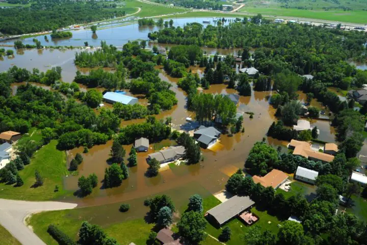 MINOT, N.D. -- Water engulfs a neighborhood in Minot, N.D., June 23, 2011. As many as 10,000 residents, about one-fourth of the city's population, have evacuated as the fast-rising Souris River inundates thousands of homes and businesses. The deluge from the Souris River is expected to exceed that of the city's historical 1969 flood, making this the region's worst flooding in four decades. (U.S. Air Force photo by Staff Sgt. Sharida Jackson) (RELEASED)