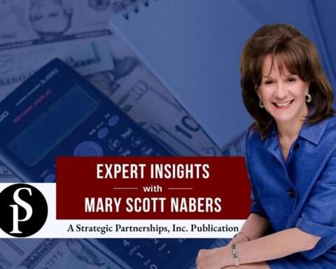 Mary Scott Nabers before a calculator and money for her weekly column.