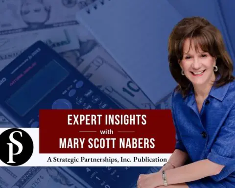 Mary Scott Nabers before a calculator and money for her weekly column.