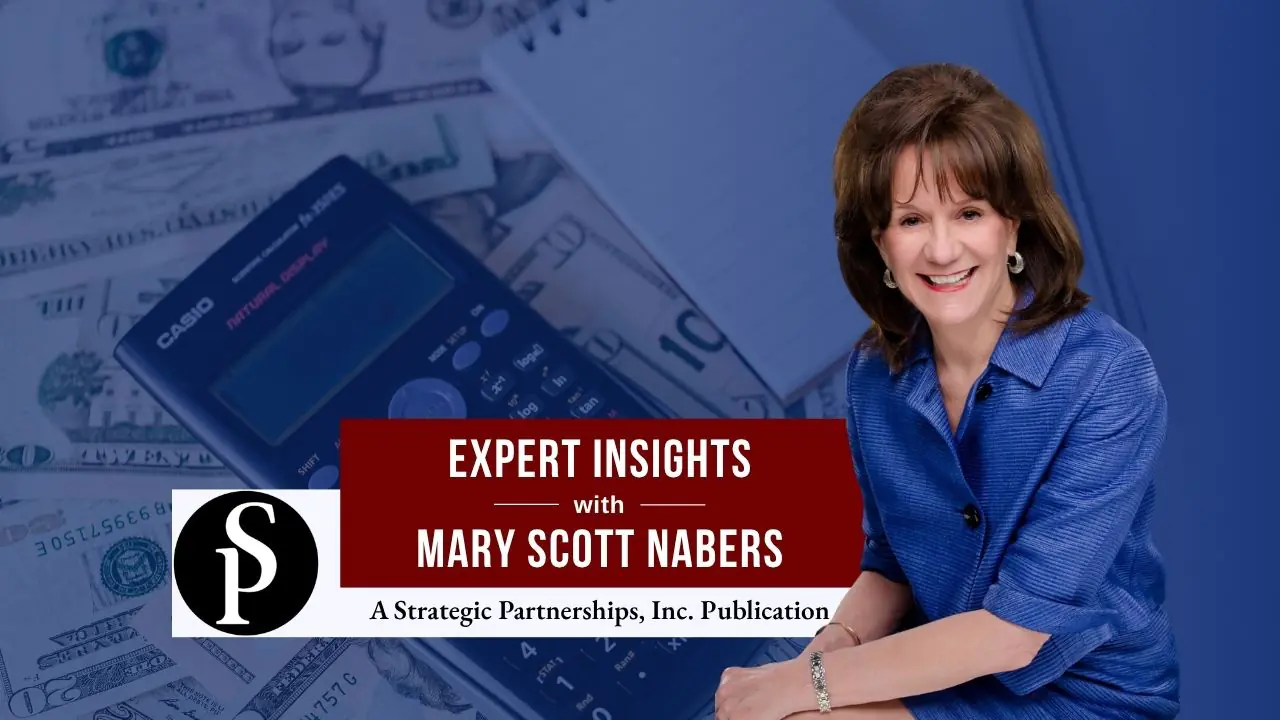 Mary Scott Nabers before a calculator and money for her weekly column.